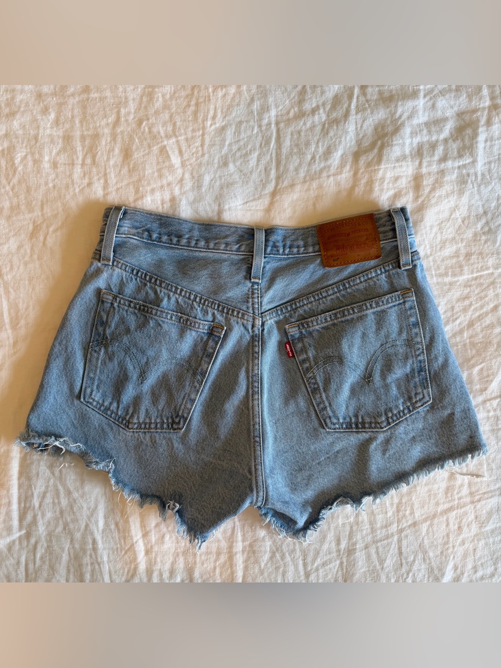 Levi's Women's 501 Light Blue Frayed Denim Cutoff Shorts